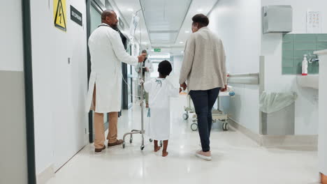 Hospital,-child-and-doctor-while-walking