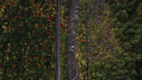 Kancamagus-Highway-Scenic-Route-during-Autumn-Fall-in-New-Hampshire,-Aerial