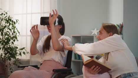 blonde woman touches arm of disabled friend in vr goggles