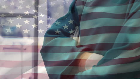 animación de la bandera de los estados unidos ondeando sobre los cirujanos en el quirófano