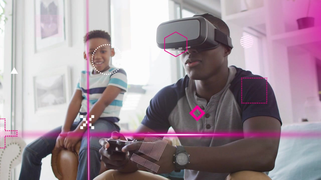 Adult male putting on VR headset and pressing gamepad, using gaming overlays, amusing boy watching