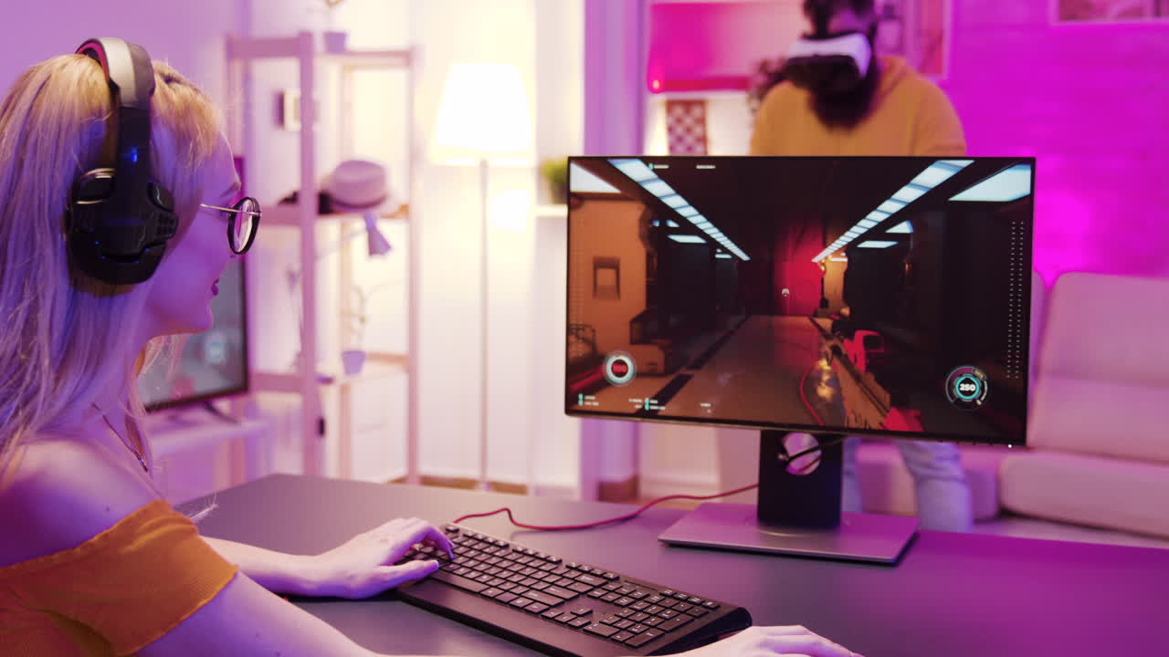Woman playing video game with VR headset