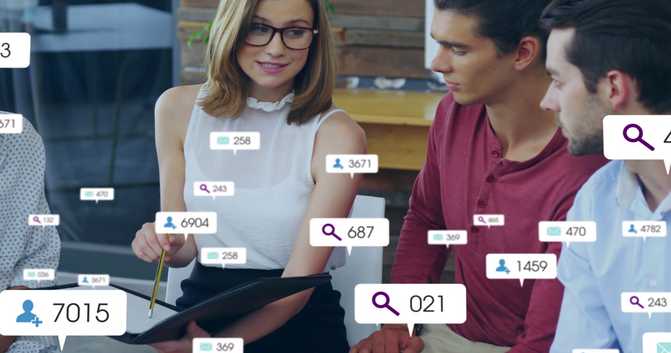 Woman pointing to folder and sharing business data, causing metric bubbles multiplying around team