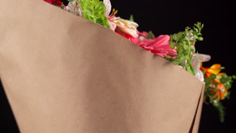 gerbera flowers bouquet arrangement spinning in back background