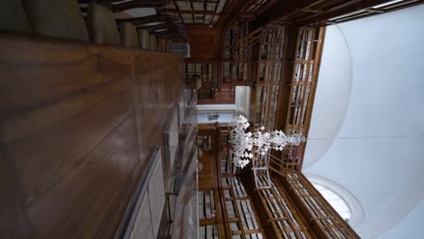 biblioteca teresiana mantova | wooden place with old books and seats