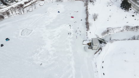 scattered skaters at martindale pond, port dalhousie ontario rennie park