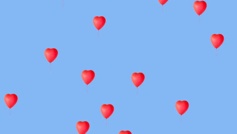 multiple heart balloons moving against blue background