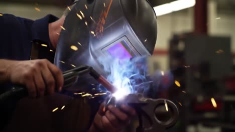 welding process in a manufacturing facility