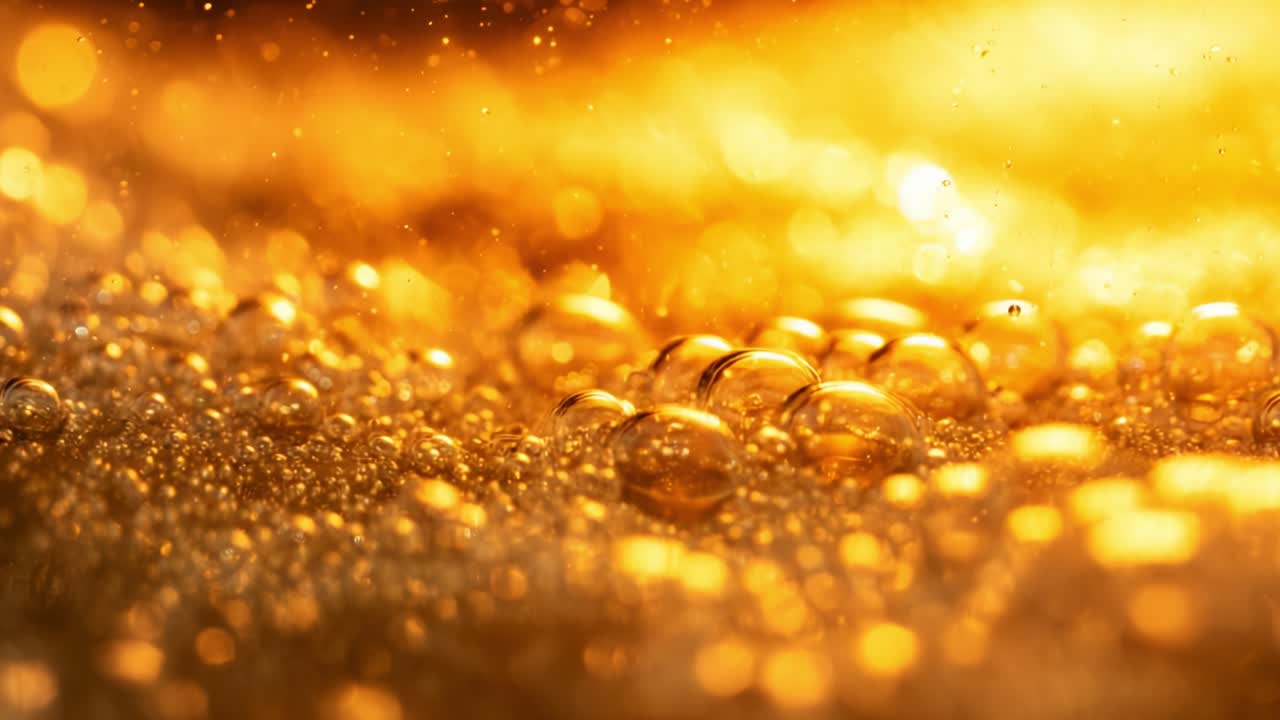 Magnificent Golden Bubbles: An Enchanting Close-Up of Effervescent Spheres Emerging from a Glimmering Surface, Capturing the Essence of Light and Color in Their Delicate Forms