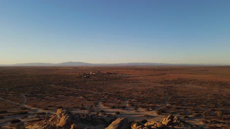 moving-towards-a-building-in-a-desert-landscape