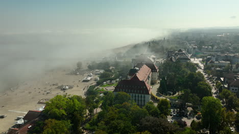 aerial view of sopot beach and resort on a misty morning