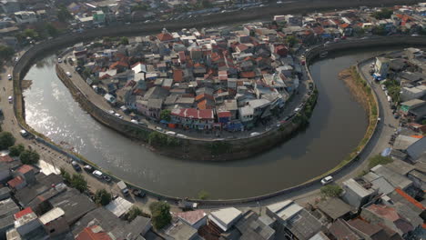 urban peninsula jakarta indonesia surrounded by canal drone rotate 4k 60fps