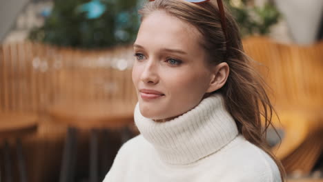 Caucasian-woman-smiling-outdoors.