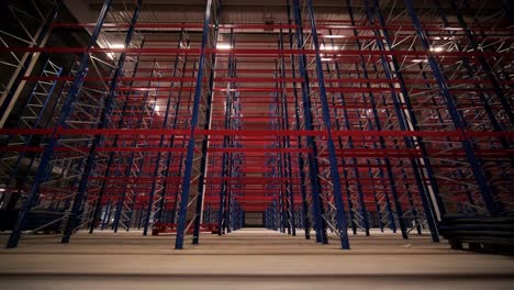 big and modern warehouse under construction, featuring metal shelving and other industrial equipment.