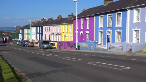 a quaint street of multicolored houses in a small village in wales 1