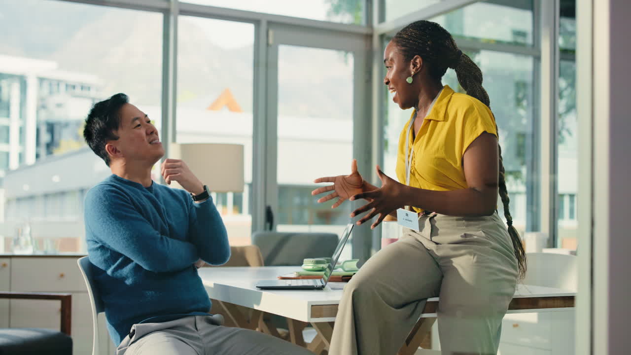 Diverse Business Colleagues Having a Friendly Discussion in Office