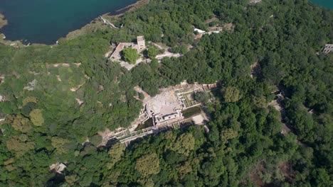 Butrint-Hill-Site-UNESCO-Archeological-Wonders,-Stone-Walls,-and-the-Enchanting-Amphitheater---Exploring-Ancient-Ruins