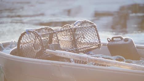 lobster pot on the fishing boat moored in the jetty