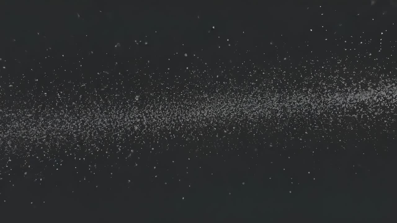 Opening sequence presenting dense white particle band flickering in void, creating ribbon pattern