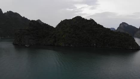 Overhead-drone-view-of-the-ocean-and-limestone-islands-of-Halong-Bay-Vietnam