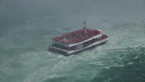 niagara city cruises boat at niagara falls sailing against the current at niagara falls