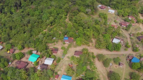 Countryside-in-Northern-Laos-surrounded-by-mountains-on-a-sunny-morning-in-Ban-That-Hium-Viangthong,-Laos