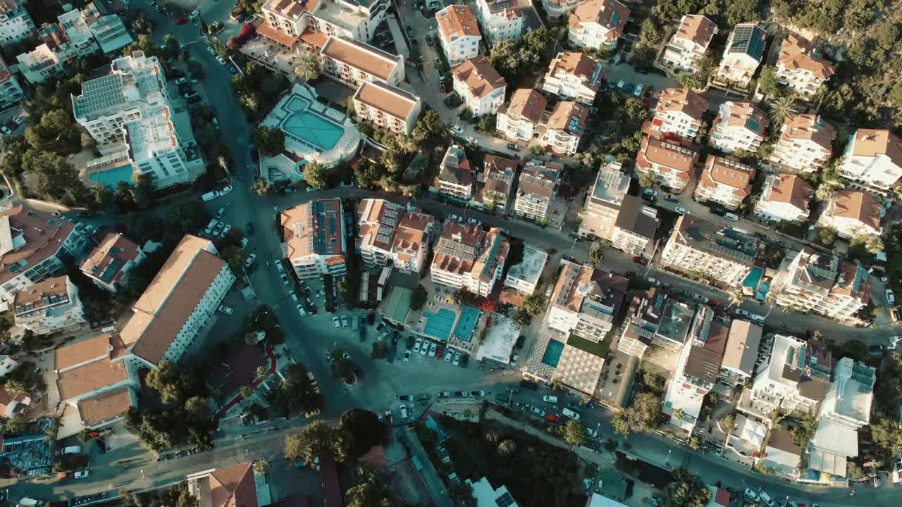 Breathtaking aerial footage showcasing Antalya’s red-tiled roofs, narrow streets, and mixed urban greenery. Capturing a unique blend of urban and natural beauty from above