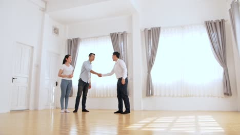 real estate agent handshake with customer