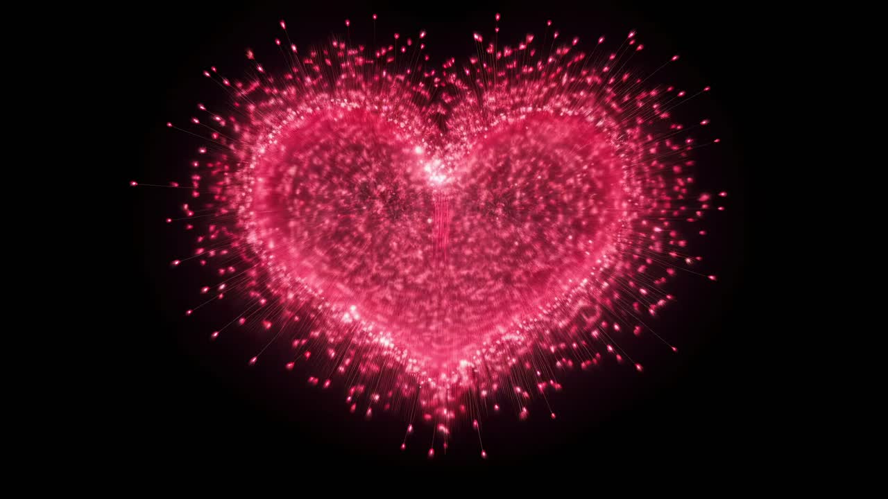 Vista aerea di un cuore rosa brillante fatto di scintille, perfetto per un video romantico