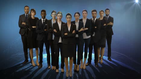 team of businesspeople standing with arms crossed