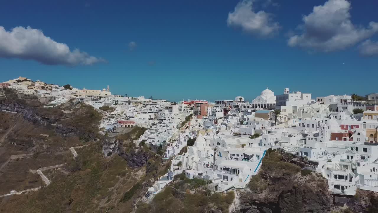 4k close aerial drone video footage of santorini fira city town over caldera cliffs dramatic scenery