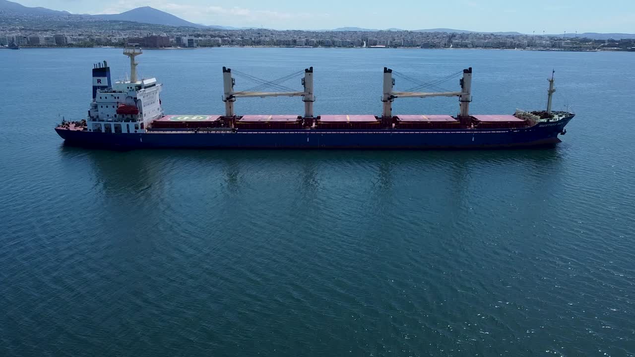 Aerial View of a Cargo Ship in a Harbor
