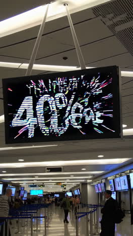airport terminal with flight information and sale promotion