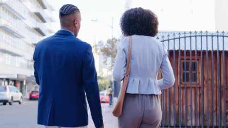 business partnership, man and woman in street