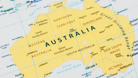 Close-up-of-the-country-word-Australia-on-a-world-map-with-the-detailed-name-of-the-capital-city