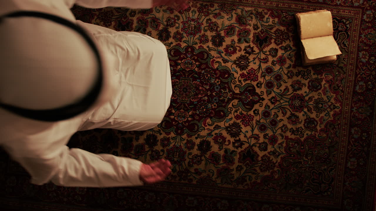 Man Praying On Carpet For Ramadan