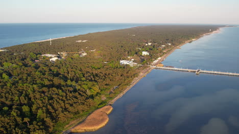 Aerial-Top-View-of-Wooden-Long-320-Metres-Pier-in-Jurata,-Hel-Peninsula-Coastline,-Poland