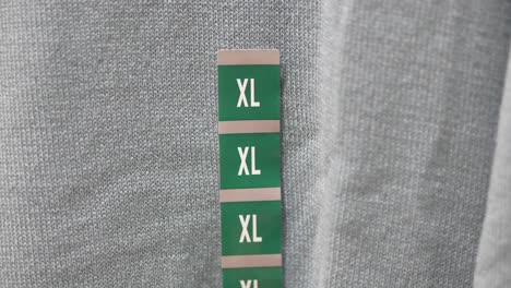 close-up of clothing size tag xl