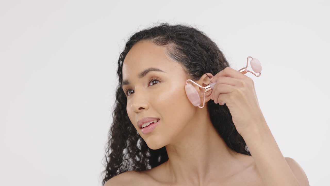 Black woman, face and beauty, facial and roller