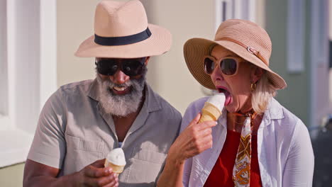 senior couple enjoying ice cream on vacation