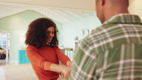 couple dancing at home