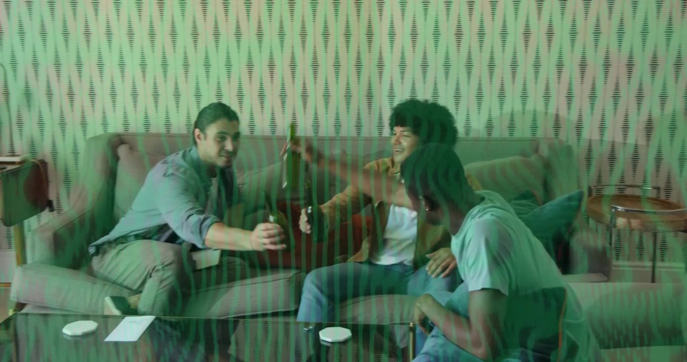 Three friends swapping beer bottles on sofa gesturing generating popping icons for beverage ad