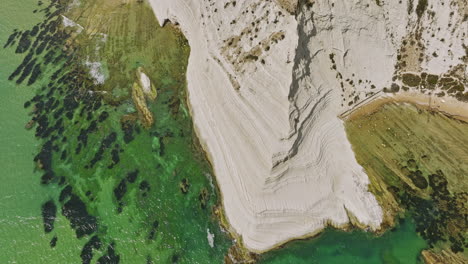 Scala-dei-Turchi-Italy-Aerial-v3-vertical-birds-eye-view-of-Stair-of-the-Turks-on-Mediterranean-coast-capturing-spectacular-rock-formation-of-white-marl-sea-cliff---Shot-with-Mavic-3-Cine---June-2023