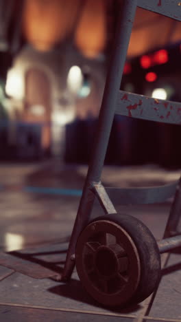 rusty hand truck in a warehouse