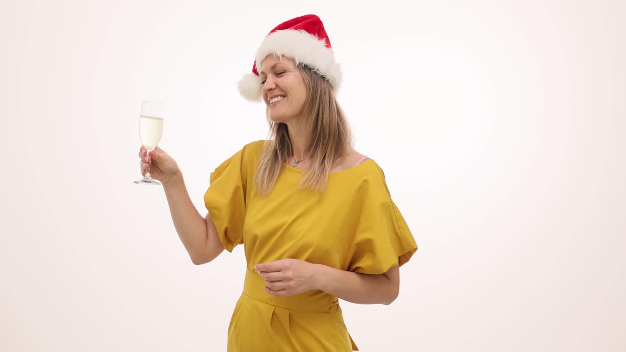 Woman in Santa Hat with Champagne