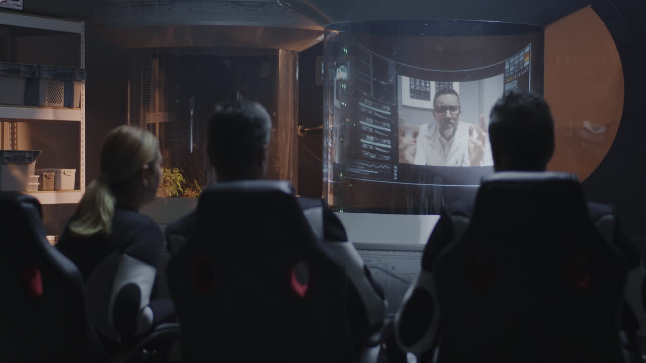 Astronauts in Space Viewing a Conference