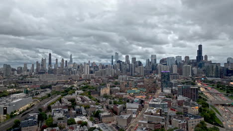 River-West-cityscape-and-traffic-on-I-90,-in-cloudy-Chicago,-USA---Aerial-view