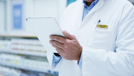 an-unrecognizable-male-pharmacist-working