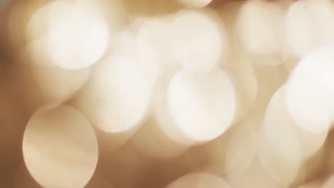 Video-of-flickering-yellow-bokeh-spots-of-light-with-copy-space