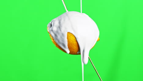 lemon covered in white substance